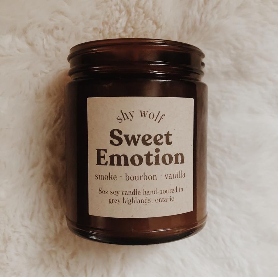 Made in Canada Sweet Emotion natural soy candle scented with smoke, bourbon, vanilla.