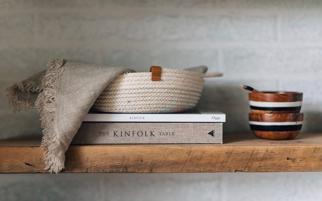 Made in Canada woven white cotton catch all bread basket holding grey scarf.