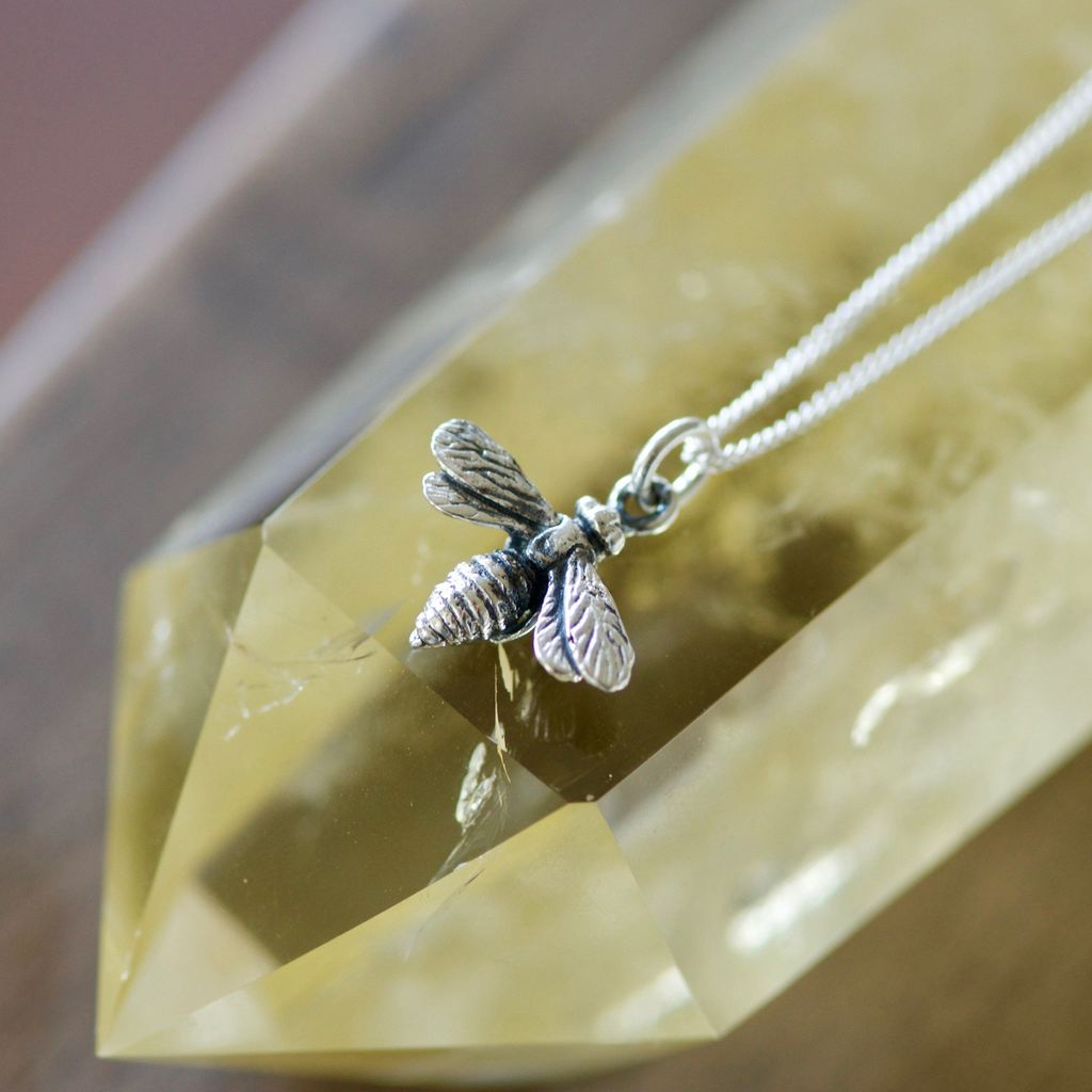 Made in Canada Justine Brooks tiny silver bee charm necklace.