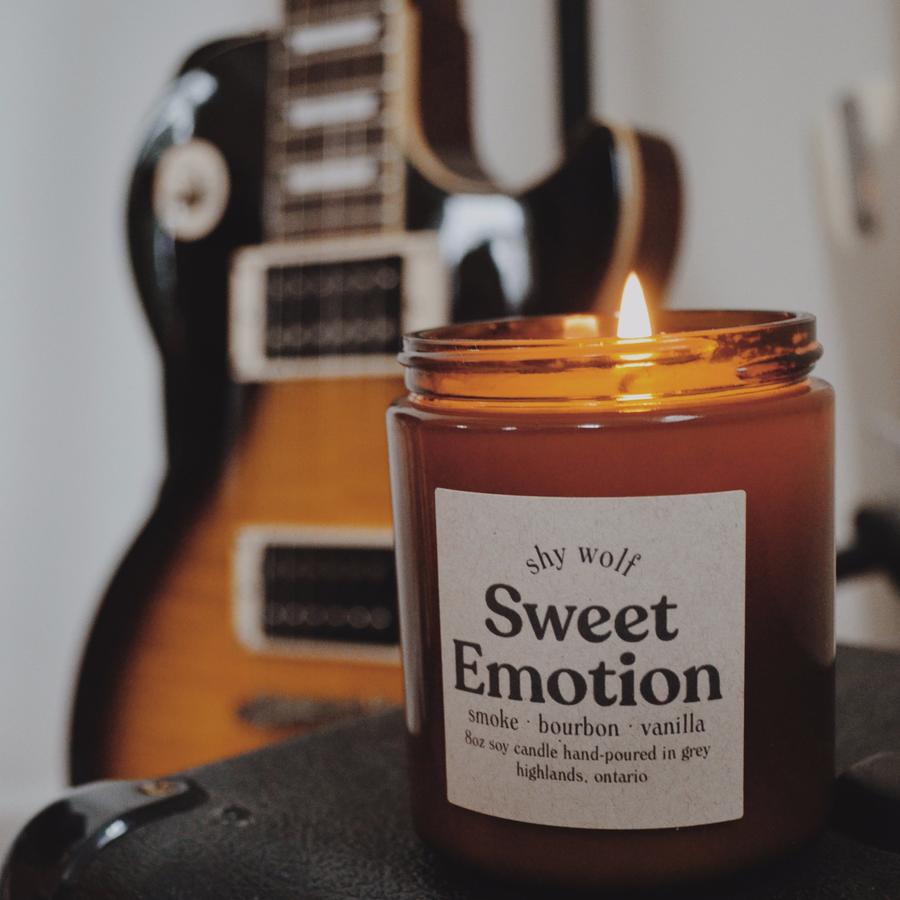 Made in Canada Sweet Emotion natural soy candle scented with smoke, bourbon, vanilla.