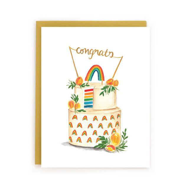 Made in Canada wedding card for LGBTQ couples, with a painting a of a wedding cake covered in rainbows and the message congrats in cursive text.