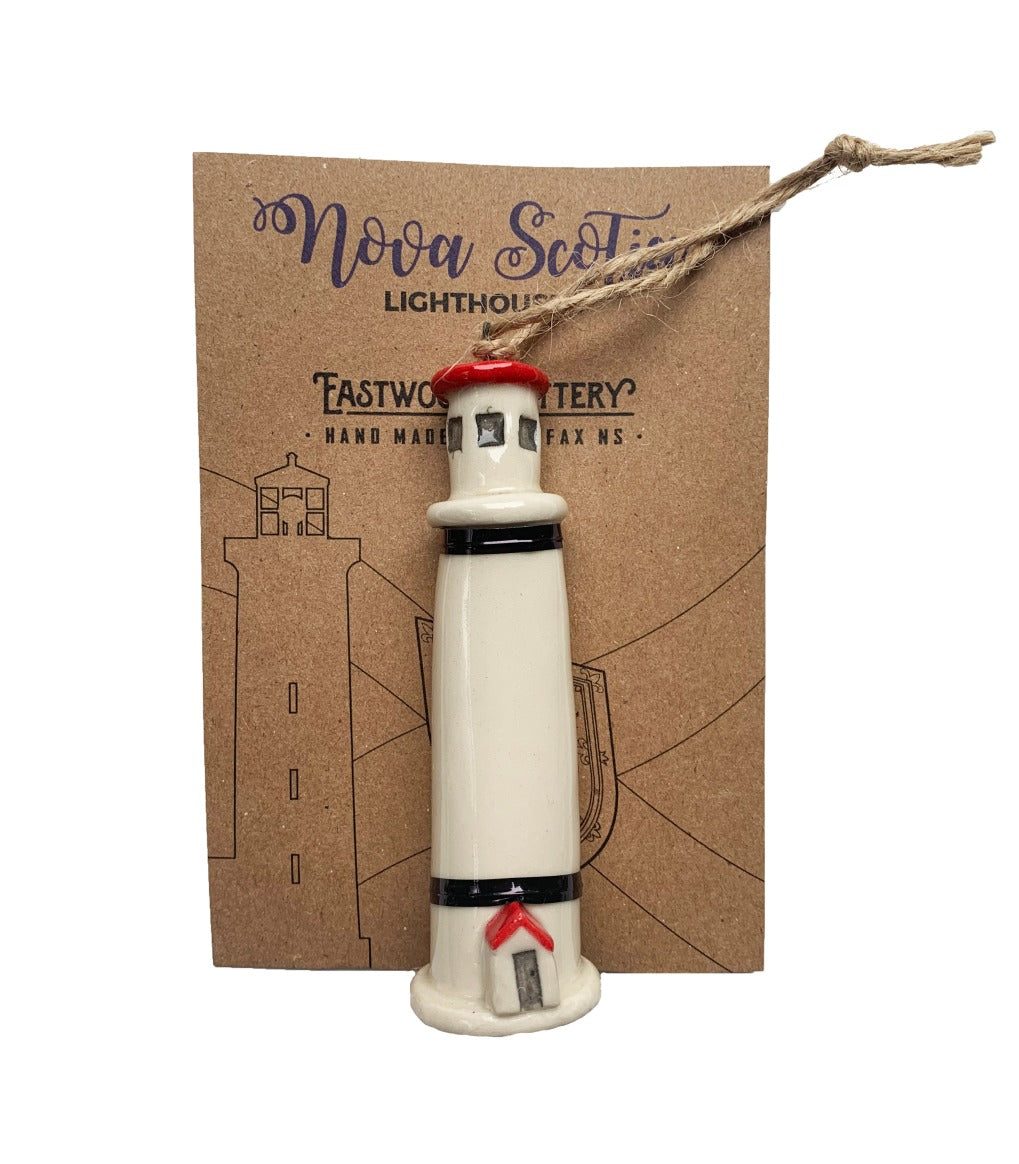 Hand painted ceramic red and white lighthouse ornament made in Nova Scotia, Canada.