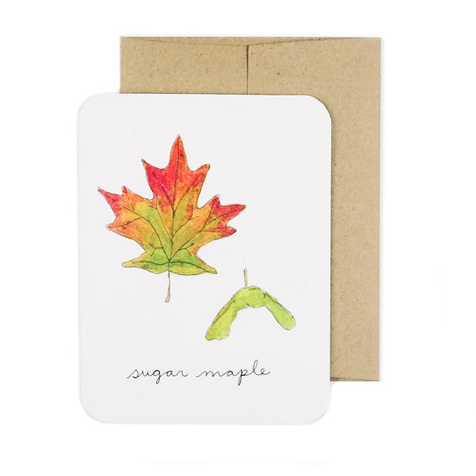Made in Canada greeting card with hand drawn red and green maple leaf and maple key with caption sugar maple.