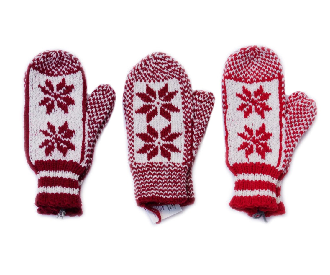 Hand knit red wool snowflake mitts from Newfoundland and Labrador, Canada.
