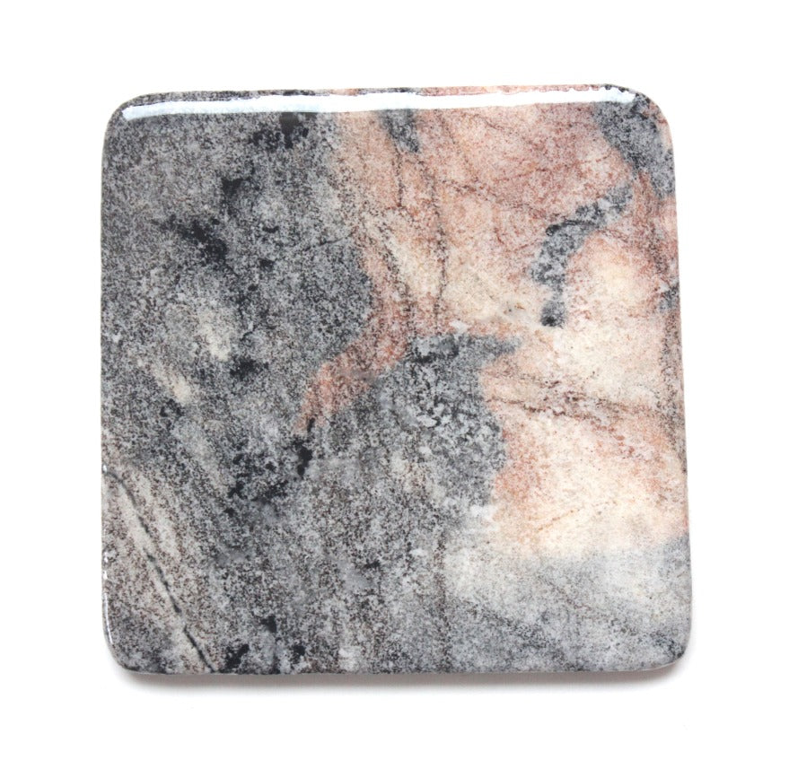 Granite coaster with natural pink and grey colours, handmade in Canada.