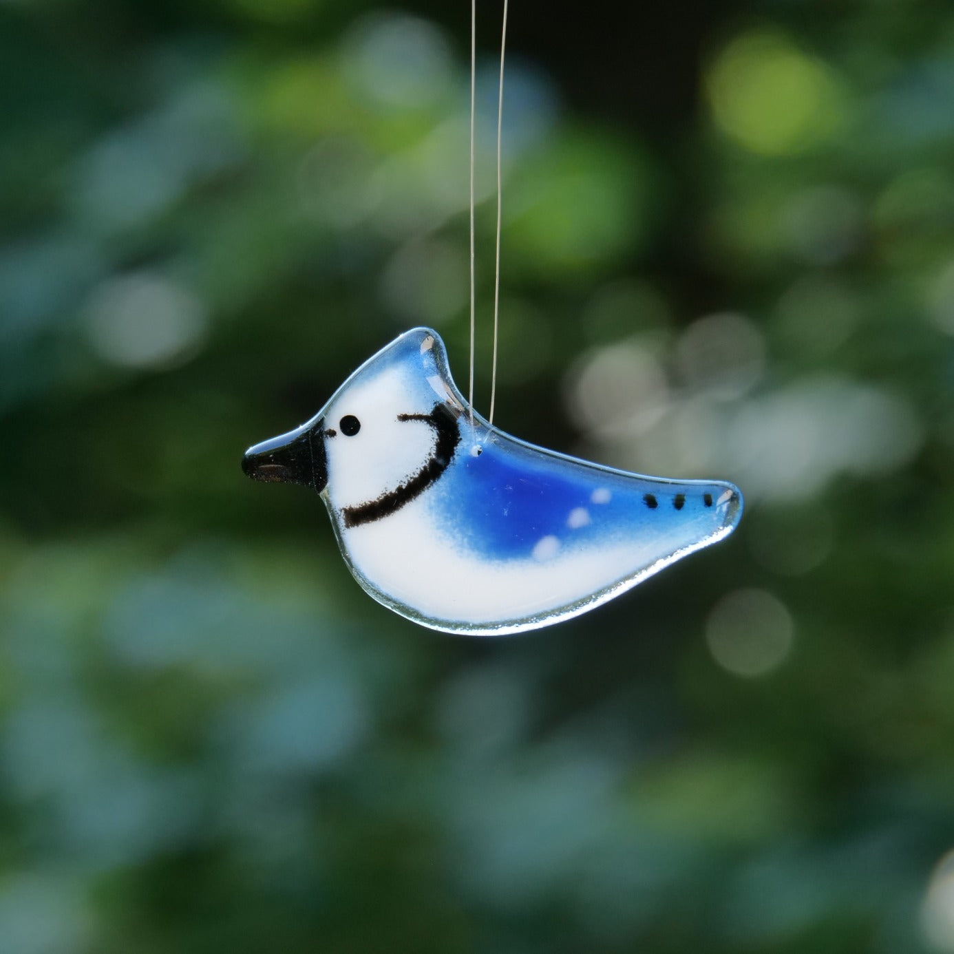 Glass Blue Jay ornament handmade in Canada.