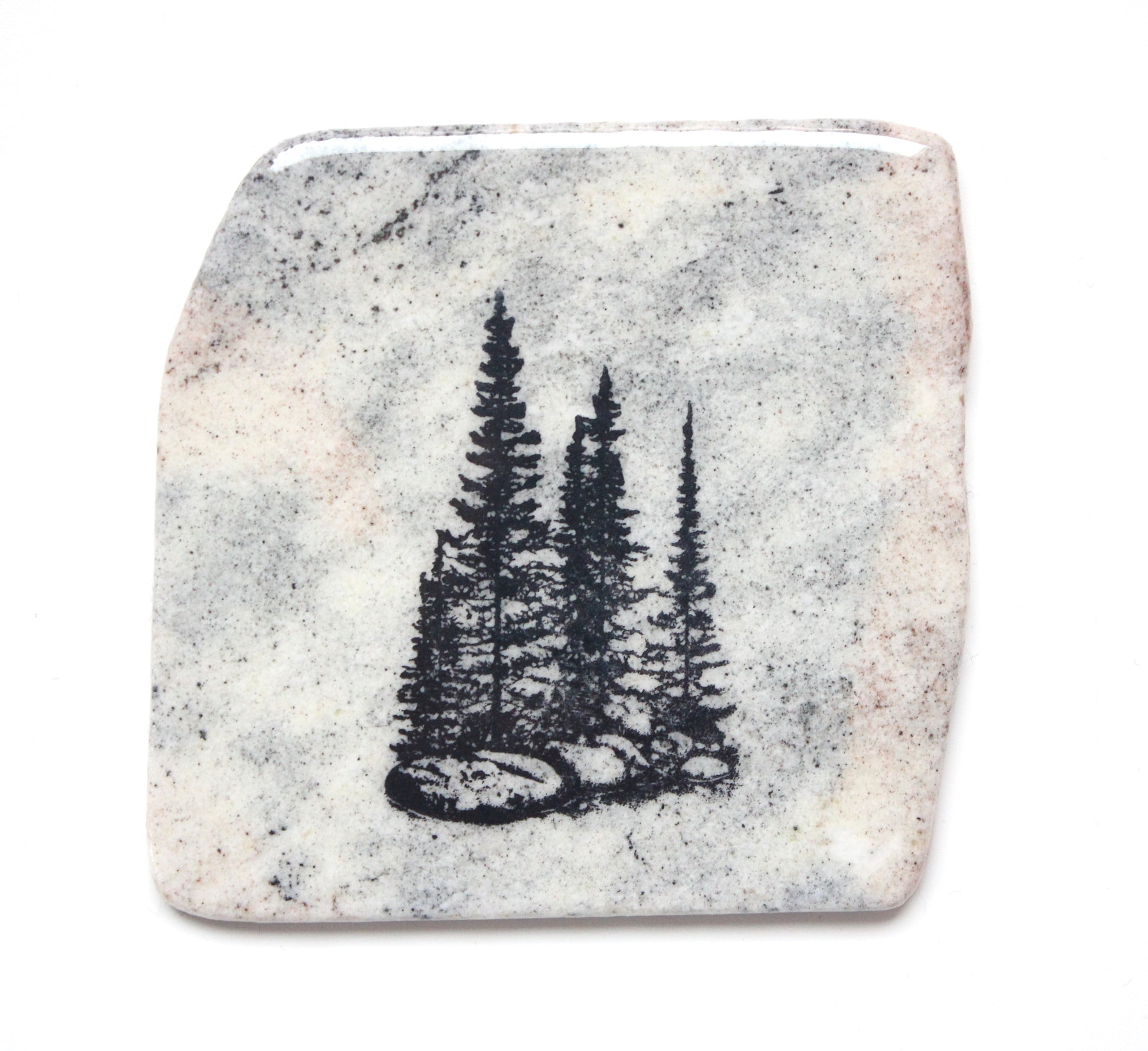 Granite coaster with three pines design made in Canada.
