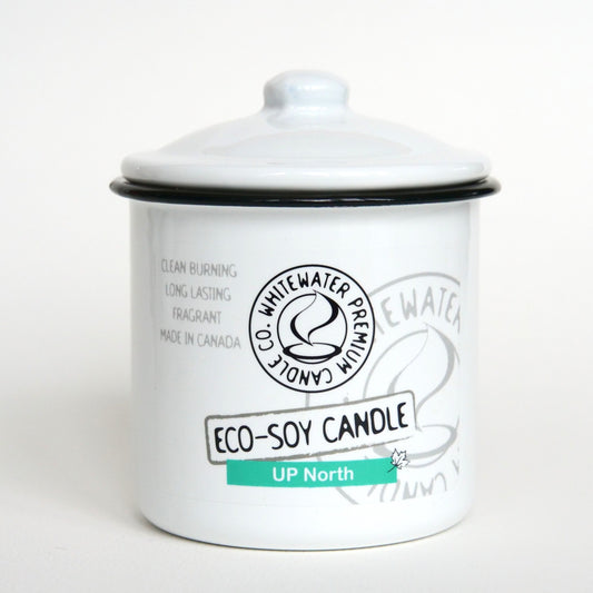 Whitewater eco soy "up north" scented candle in white enamel jar.
