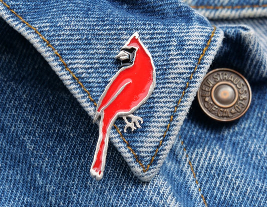 Sterling silver Cardinal brooch pin with painted enamel, made in Canada by Slashpile Designs.